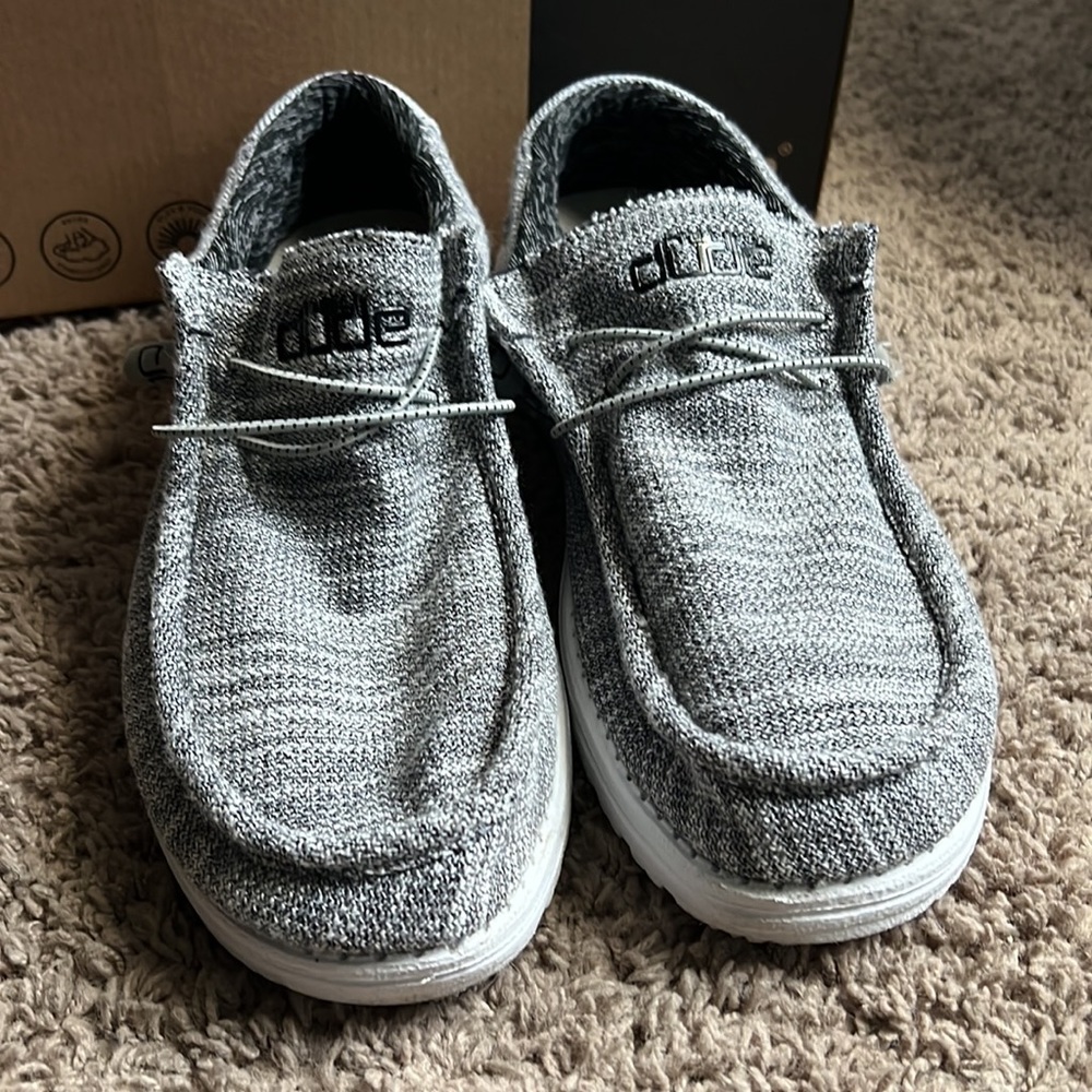 Never worn size 11 Hey Dude comfortable type of shoe with granite as the color